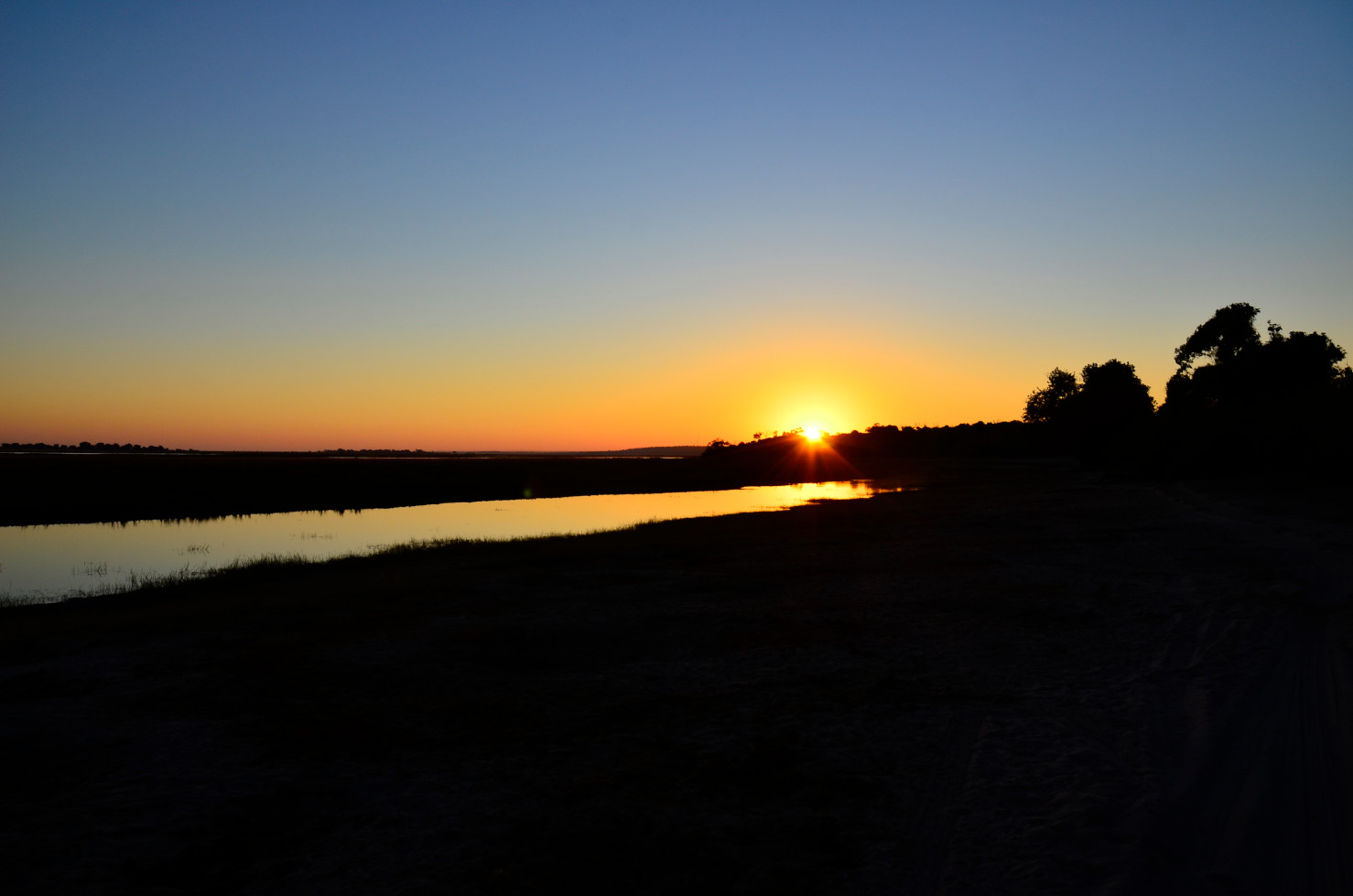 Sonnenaufgang am Chobe River.